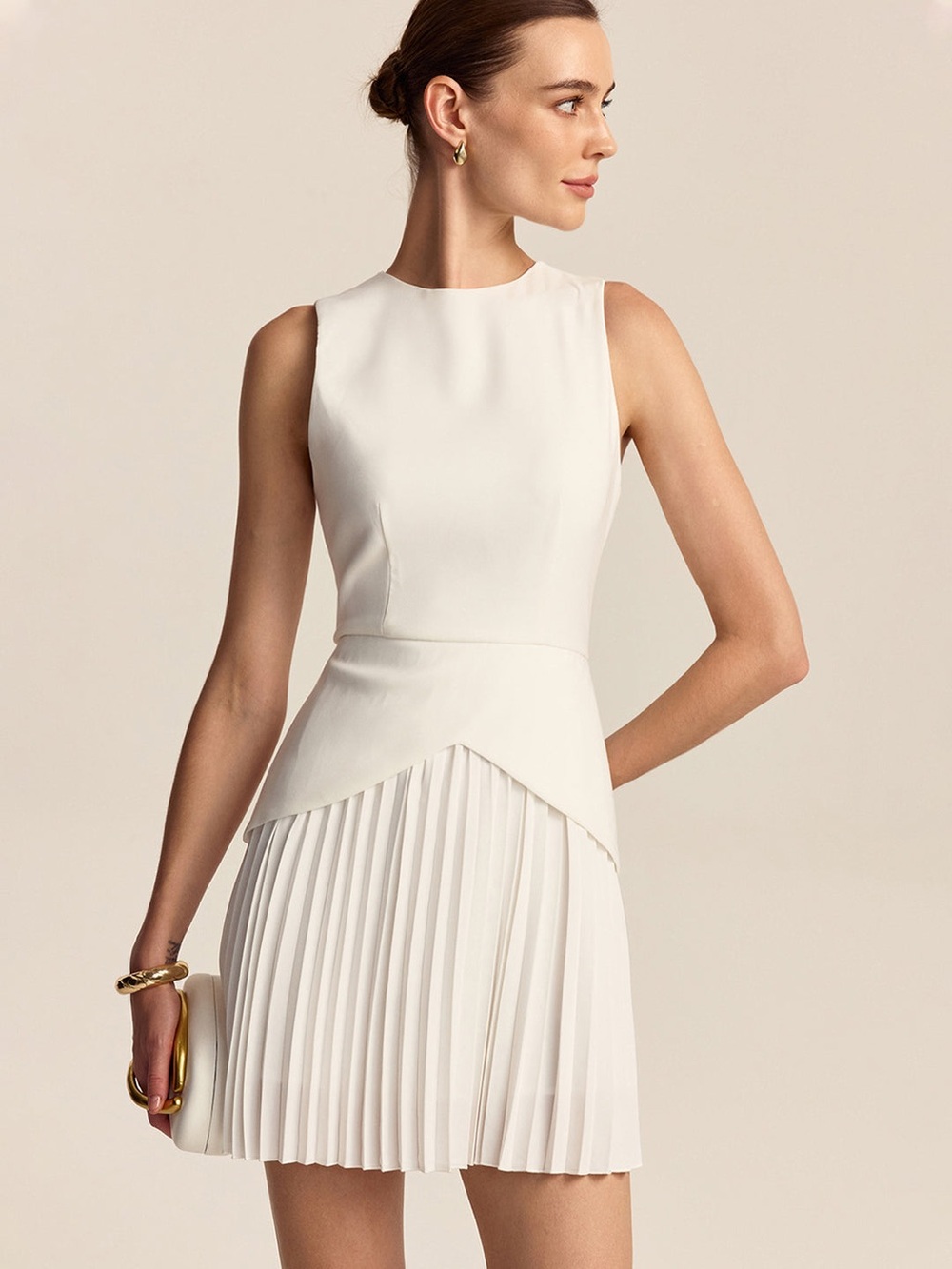 Sleeveless White Pleated Peplum Dress